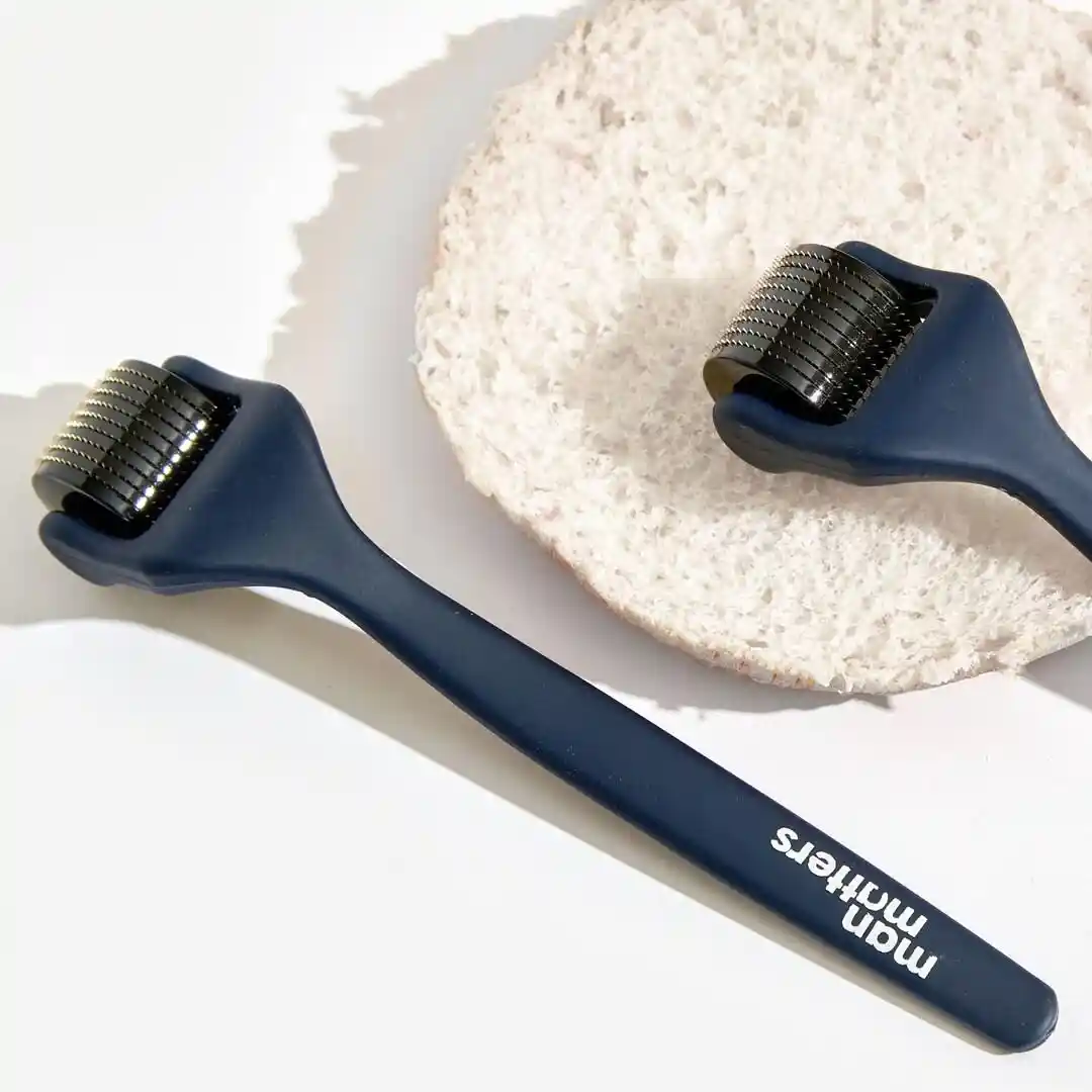Derma Roller (Microneedling) tool to boost the effectiveness of men's hair regrowth treatments.
