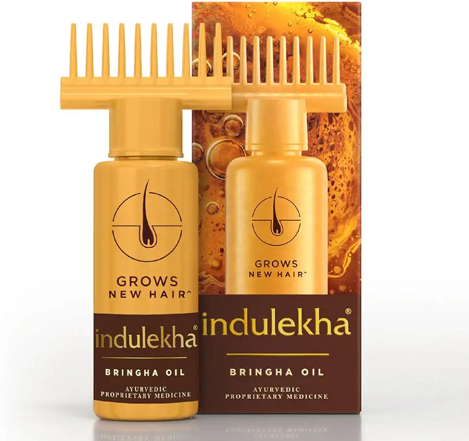 Indulekha Bringha Oil Ayurvedic medicine for hair growth featuring the "Selfie" comb applicator for direct scalp application.